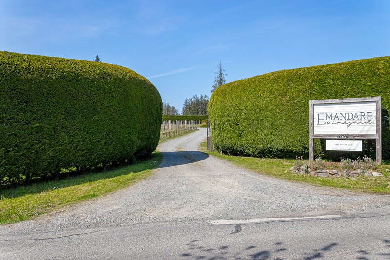 Entrance sign and driveway at Emandare Winery and Vineyard near Duncan, British Columbia