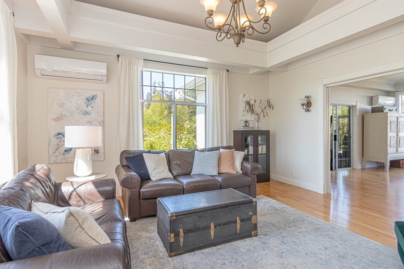 Sunlit living room in the renovated 1937 farmhouse at Emandare Winery